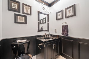 Located down the hall is the Powder Room