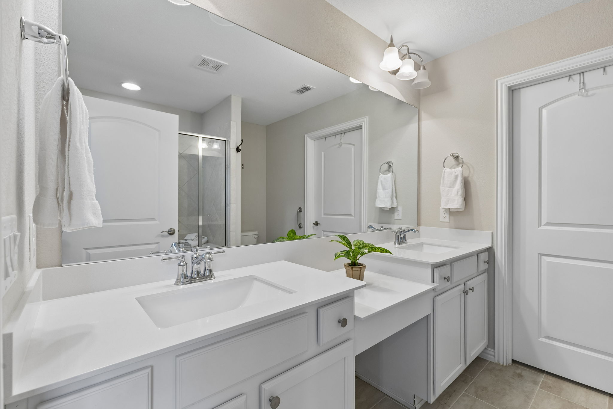 primary bathroom w vanity area and dbl sinks