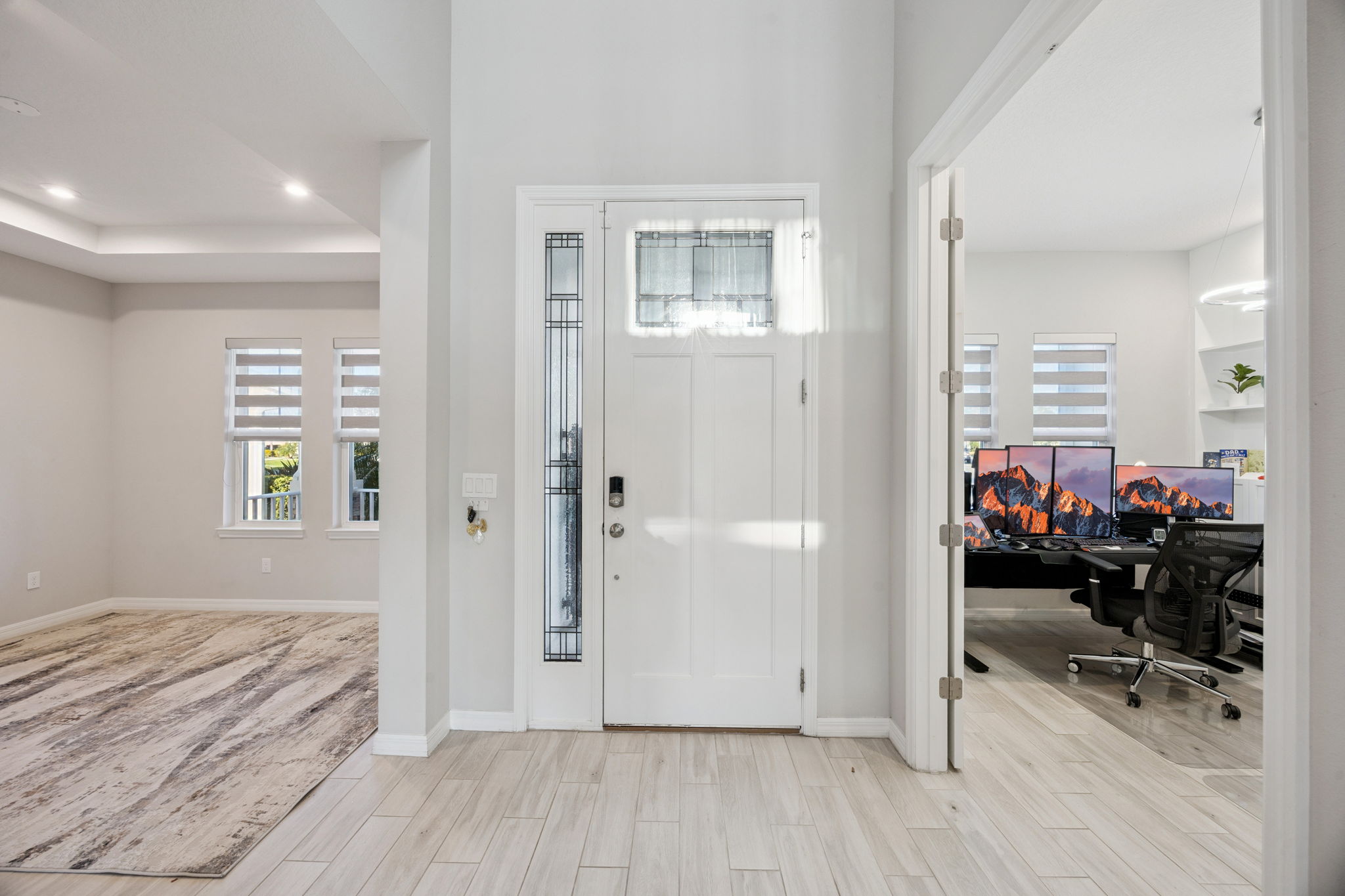 Foyer opens up to office