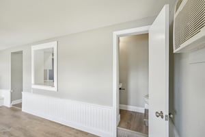 family room with half bath to right