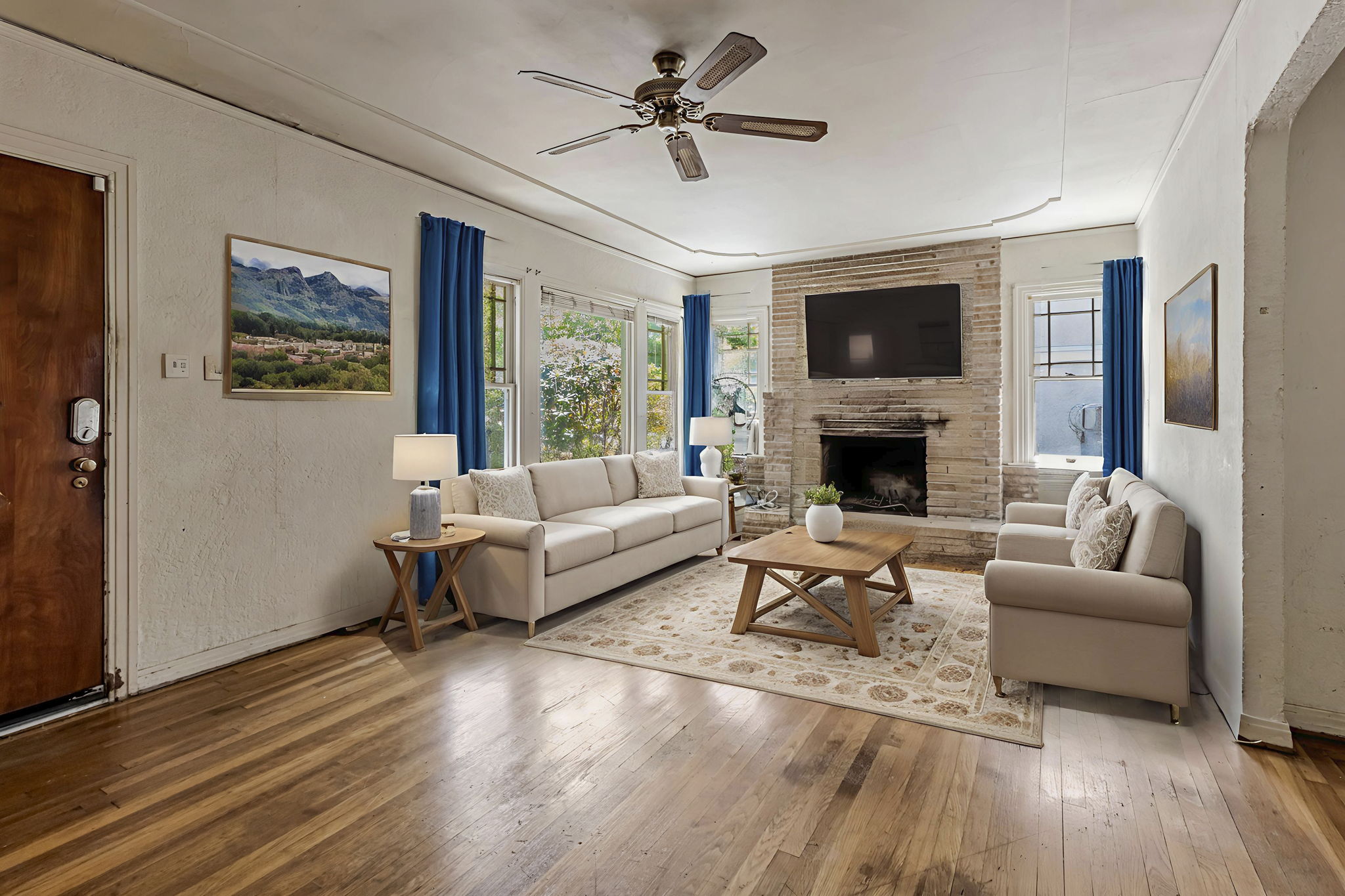 Charming & Welcoming Living Room with Cozy Fireplace!