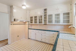 Tons of Kitchen Storage with Display-Style Cabinets!
