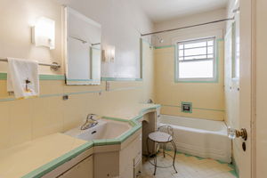 Charming Original Tile in Bathroom & Built In Vanity Area!
