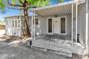 Enjoy Entertaining Under the Shade of the Trees & Your Personal Covered Back Patio!