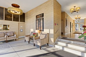 A warm, well-maintained lobby with inviting seating—comfortable, simple, and quietly polished.