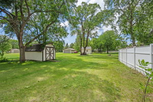 Huge lot with shed and fenced area off the garage and house
