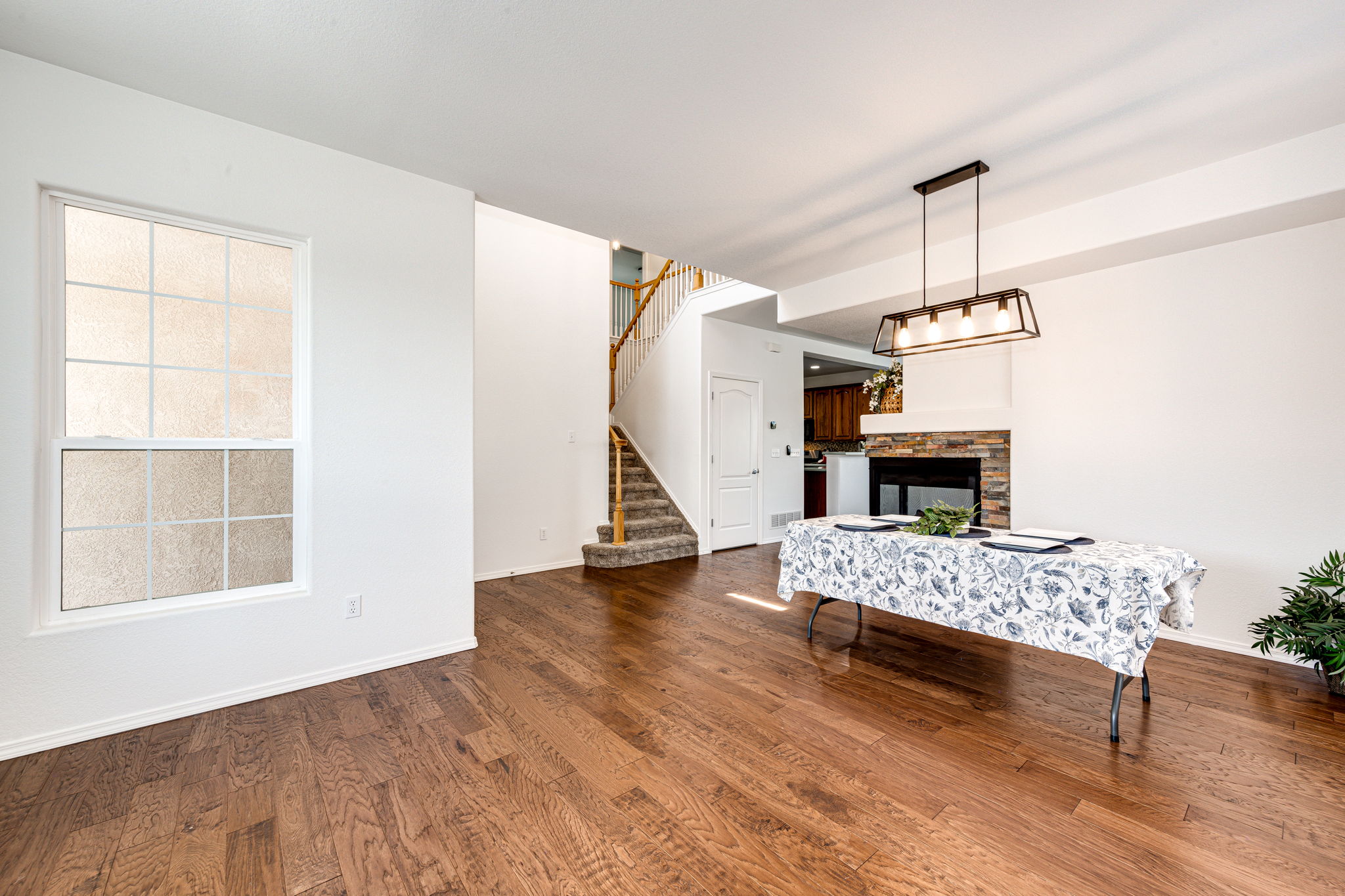 Stunning Wide Plank Hardwood Floors & Dual Fireplace