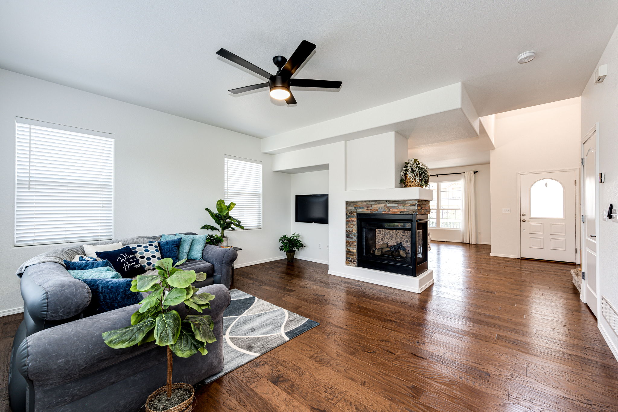 Family Room w Dual Fireplace & T.V. Nook