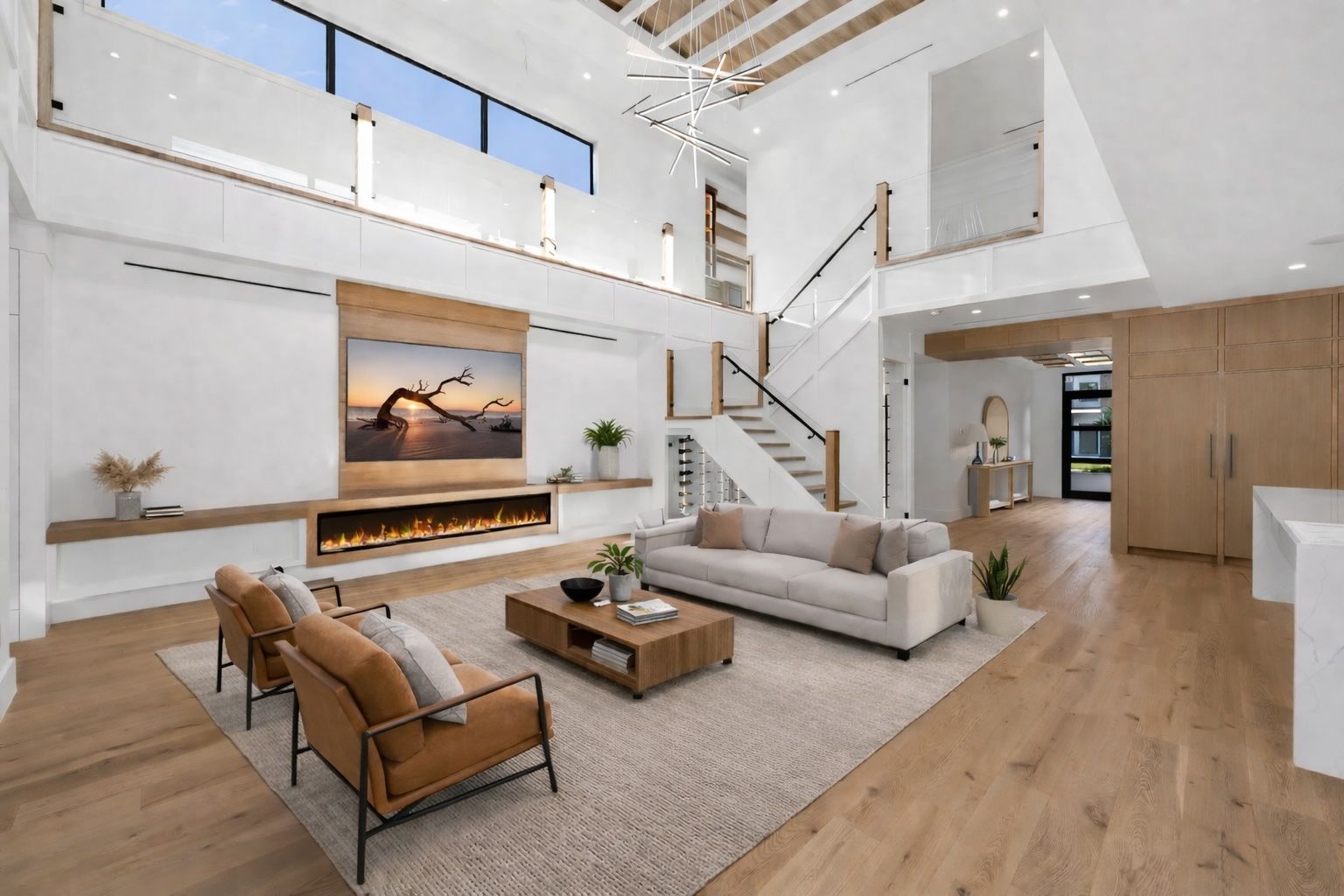 View 1 (virtually staged) - Open living area overlooking the pool, highlighted by soaring 22’ ceilings and an airy, expansive feel.