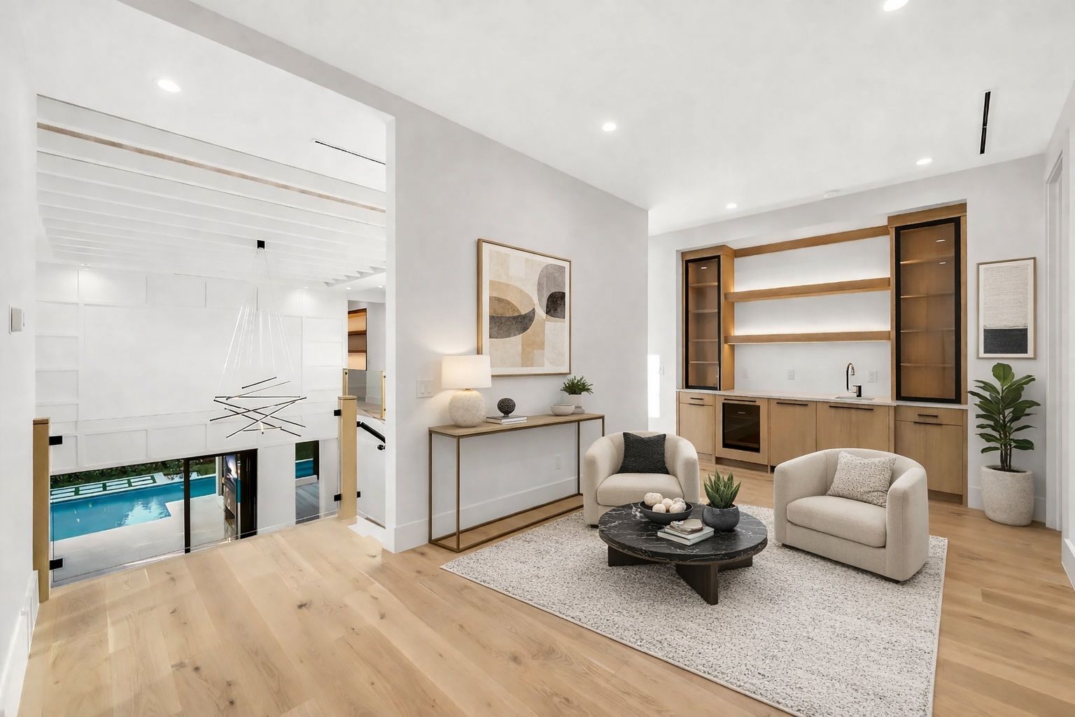 Virtually Staged - Guest loft featuring a wet bar and dishwasher for added comfort and convenience.