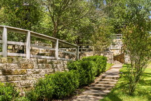Steps to the river, terrace with a view on the left.