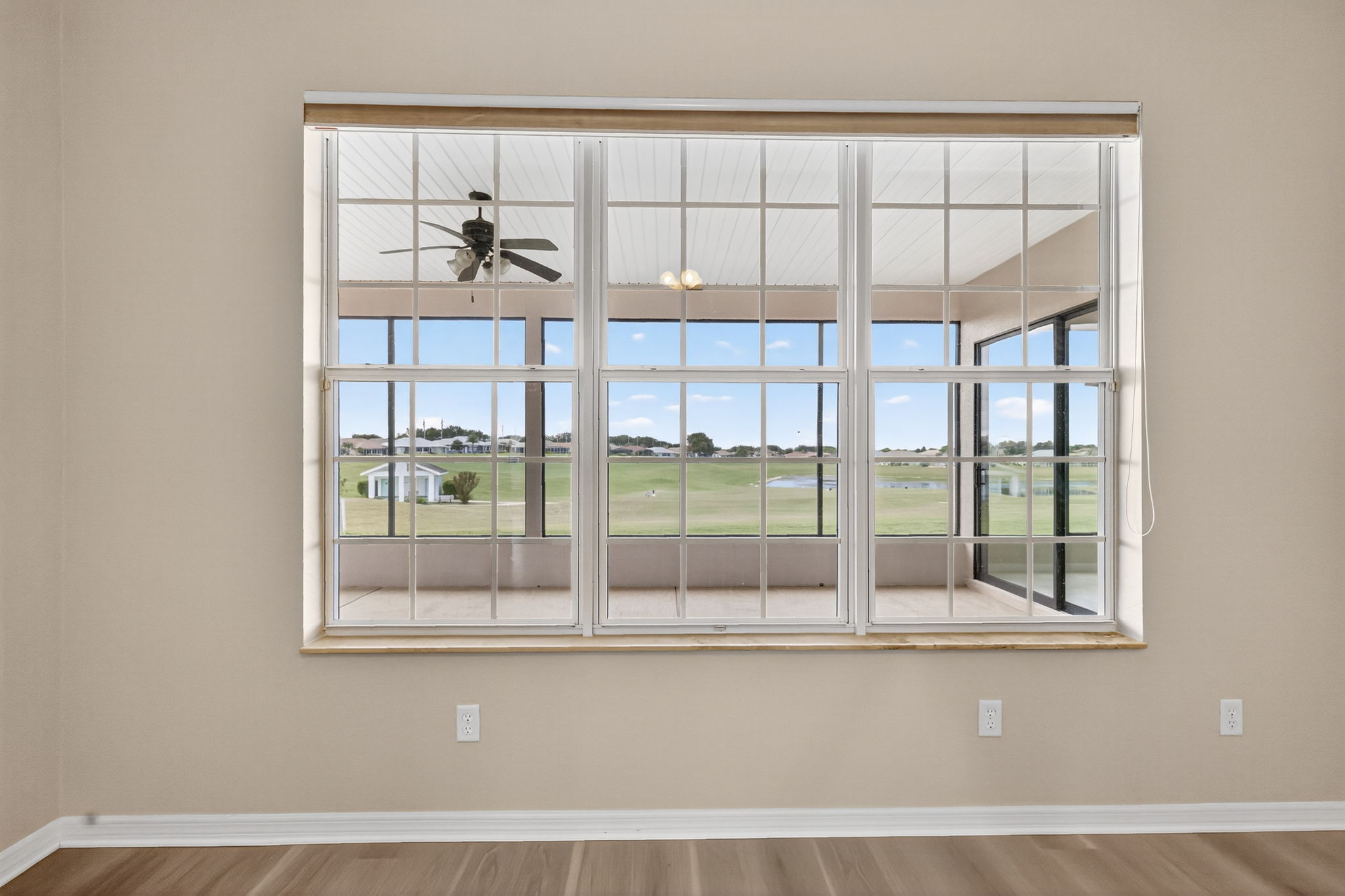 Primary Bedroom with Golf and Water Views