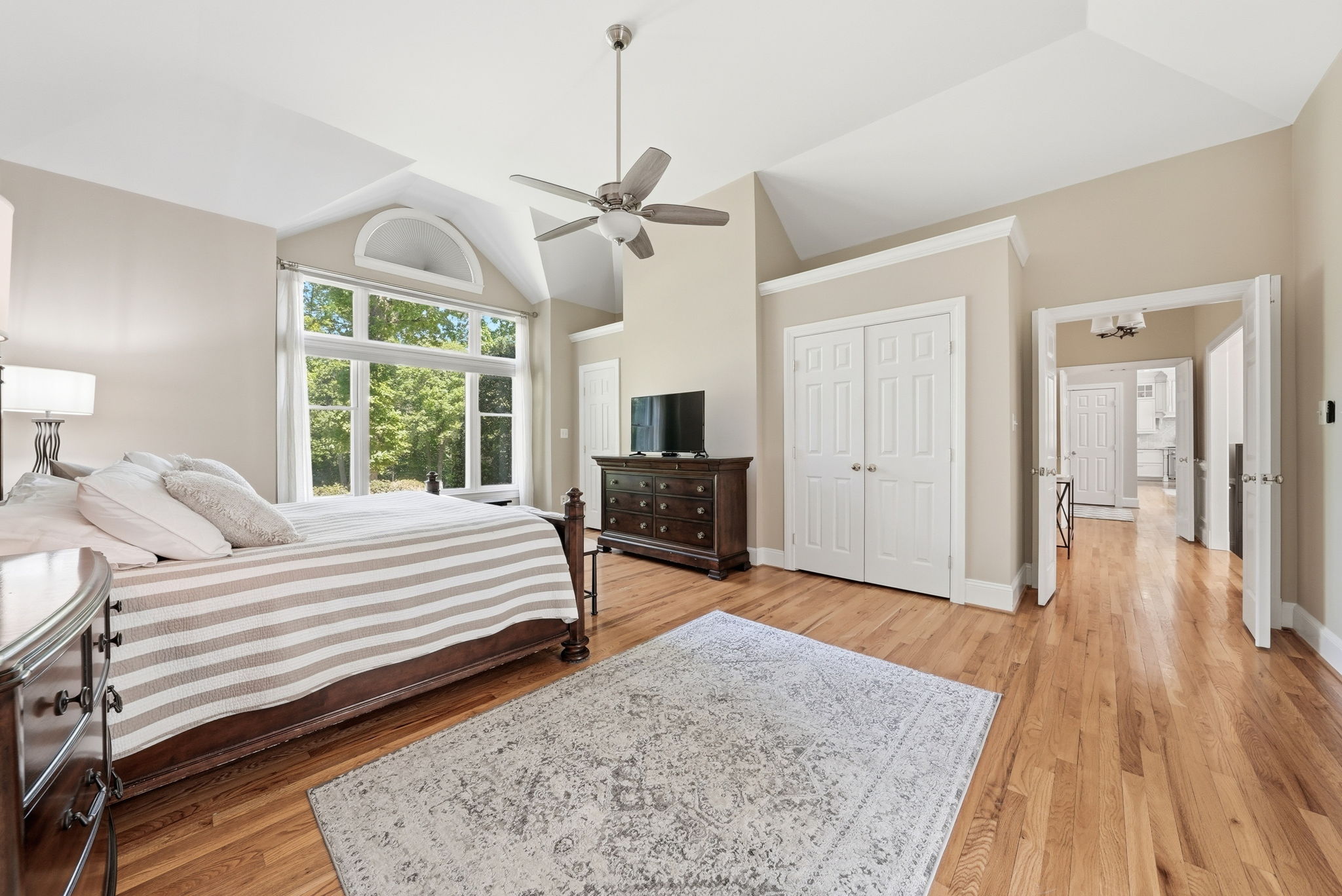 PRIMARY BEDROOM INCLUDES THREE CLOSETS