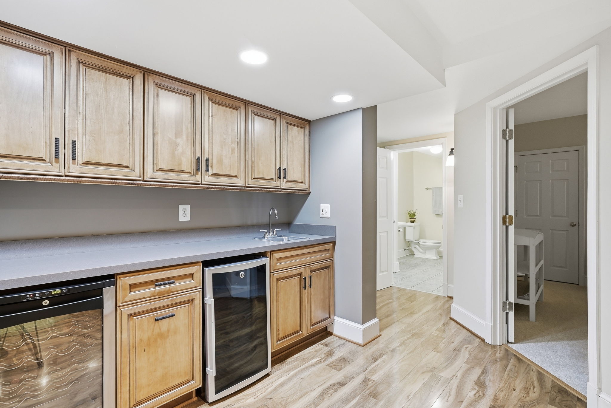 LOWER LEVEL WET BAR WITH 2 WINE & BEVERAGE CENTERS