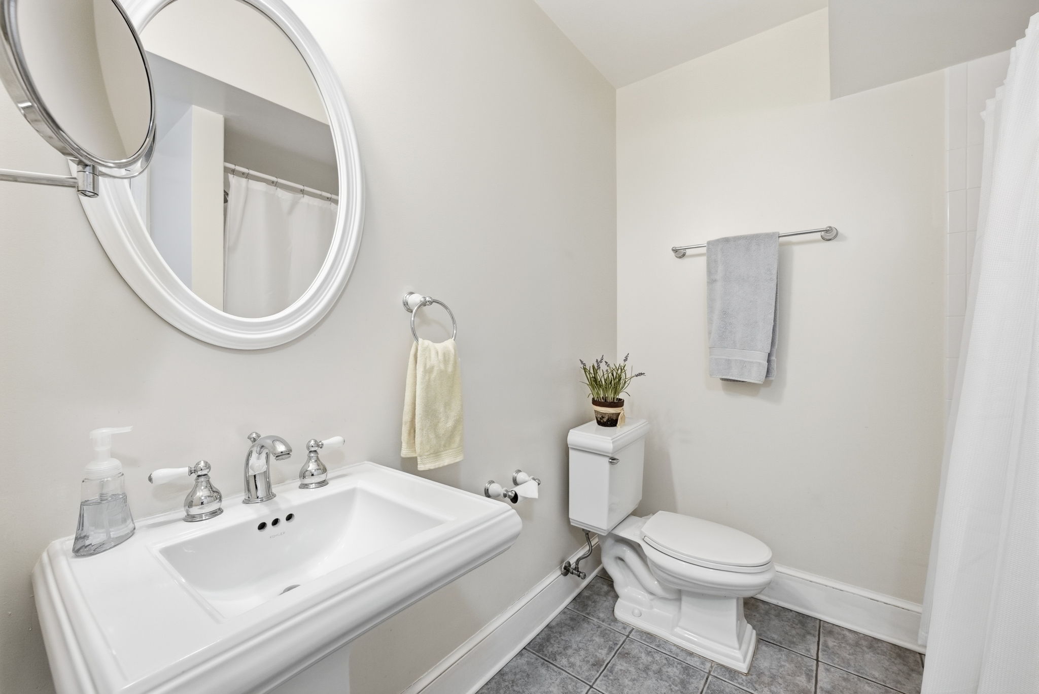 ENSUITE BATHROOM WITH SHOWER/TUB IN LOWER LEVEL