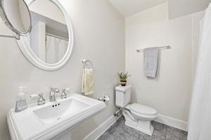 ENSUITE BATHROOM WITH SHOWER/TUB IN LOWER LEVEL
