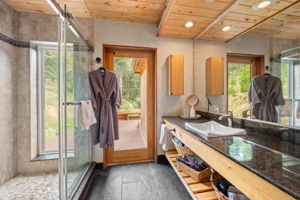 Primary Bathroom with a Door to the Rooftop Retreat