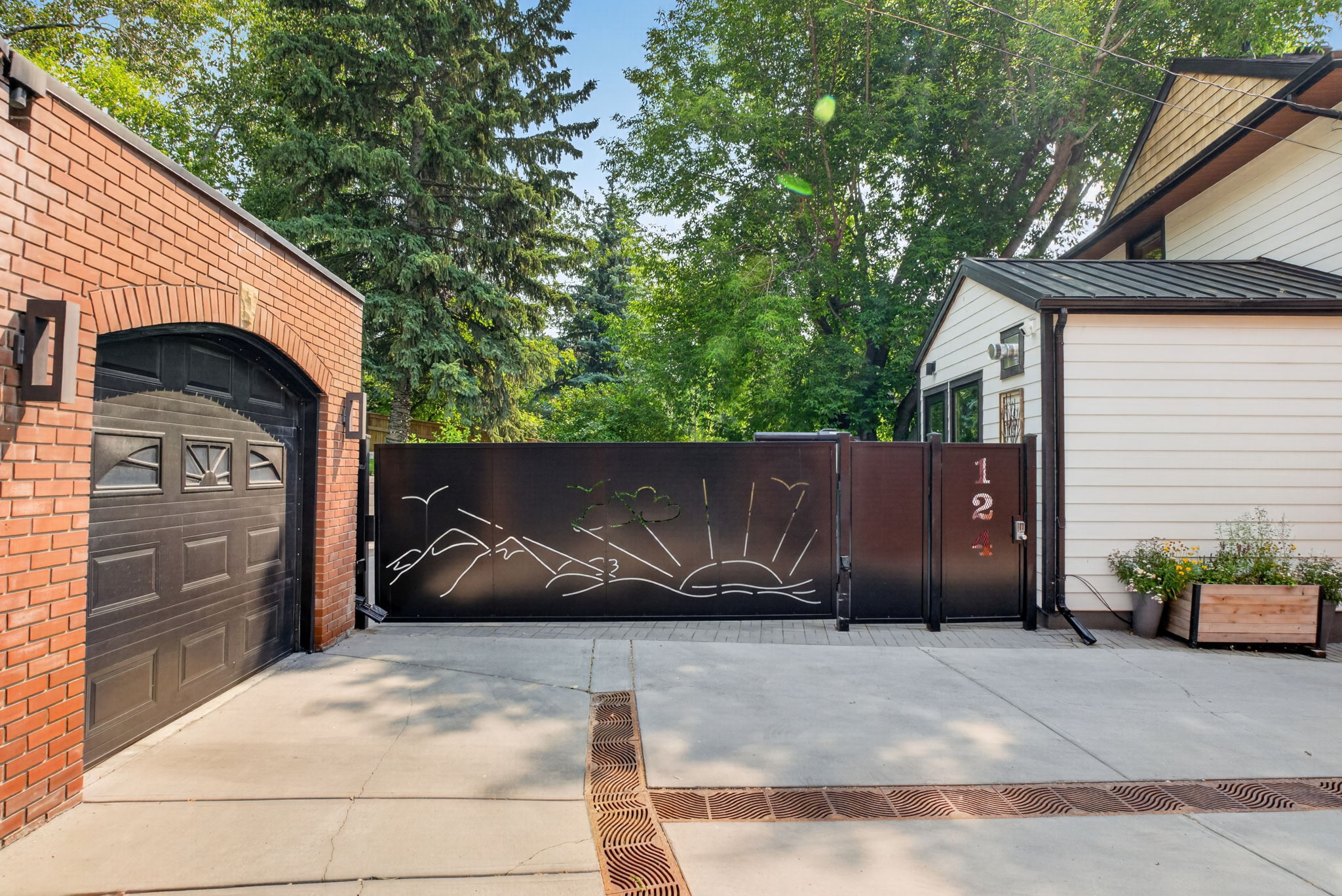 Gated motor court with custom steel gates