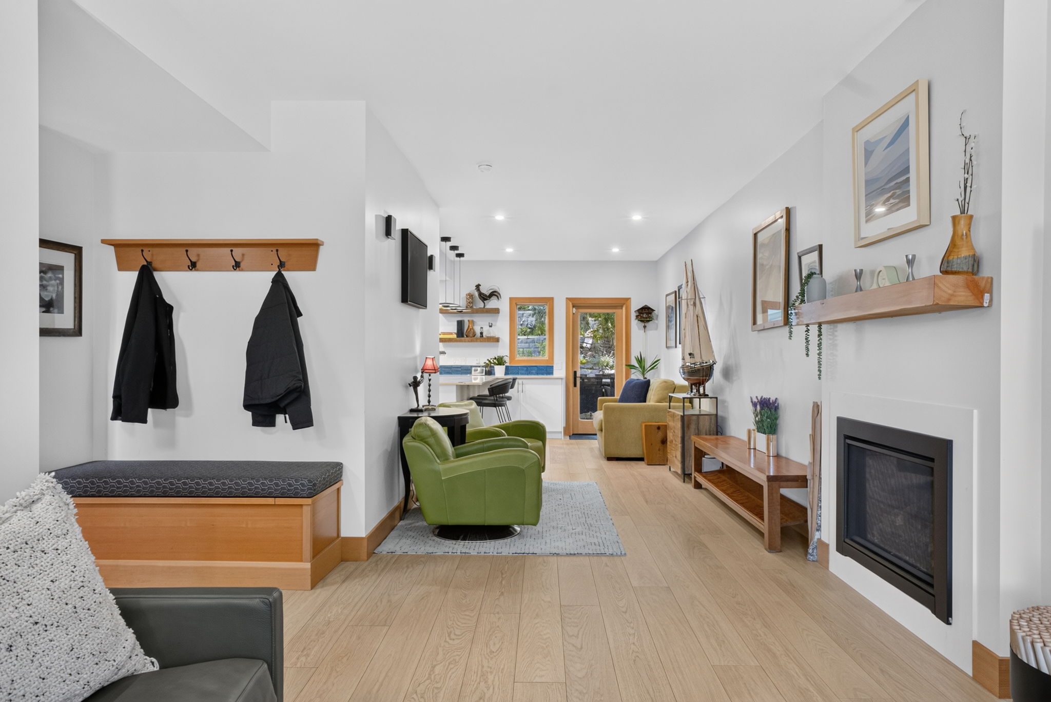 Warm living spaces anchored by a fireplace