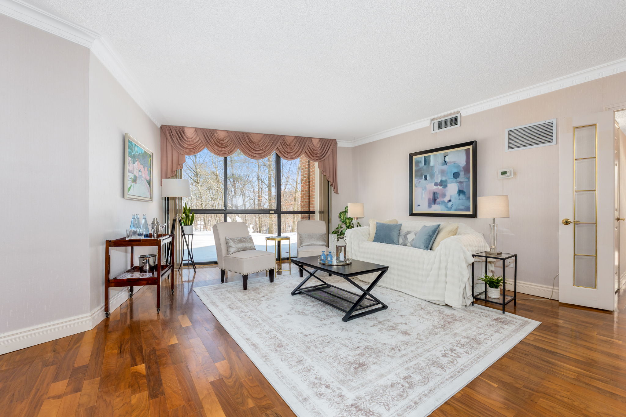 Floor to ceiling window in large living room