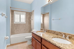 Guest Bathroom Off Guest Wing Hallway With Dual Sinks & Granite Countertop