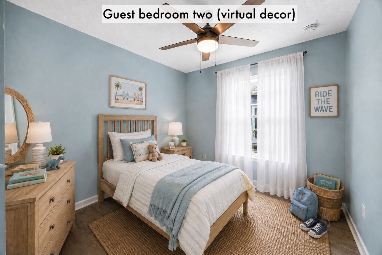 Guest bedroom two is virtually staged to illustrate a cheerful space for children, visitors or a home office