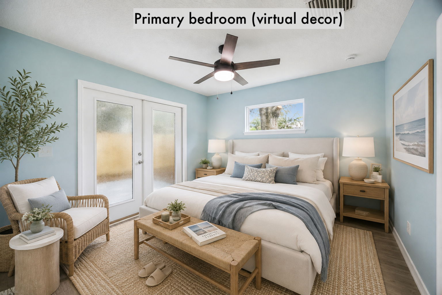 The primary bedroom is virtually staged to show its calm proportions and relaxed coastal character
