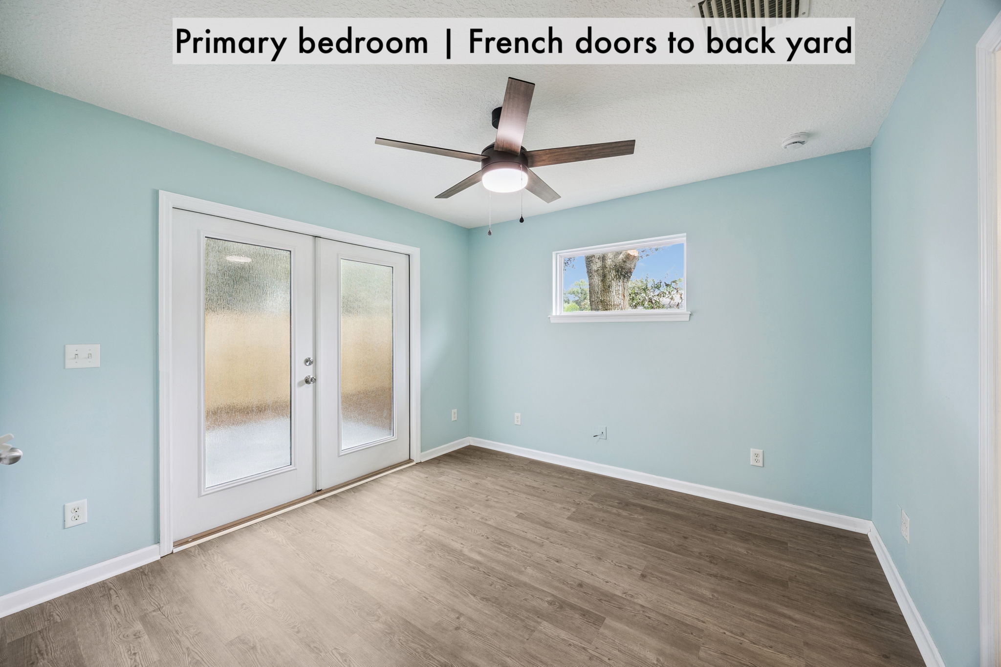 French doors open directly to the backyard, bringing in natural light and an easy connection outdoors …