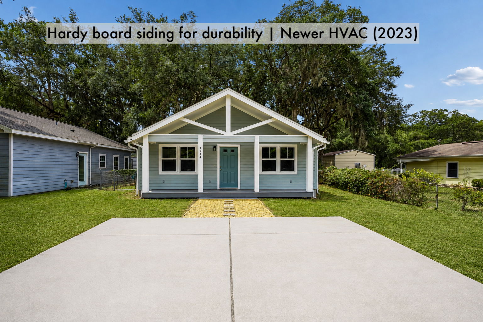 Durable fiber-cement siding, crisp architectural lines and a wide concrete driveway complete the refreshed exterior
