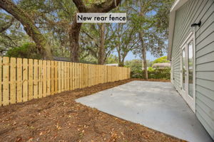 A newly fenced backyard creates a more private setting for outdoor dining, play or quiet evenings