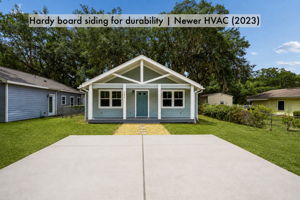 Durable fiber-cement siding, crisp architectural lines and a wide concrete driveway complete the refreshed exterior