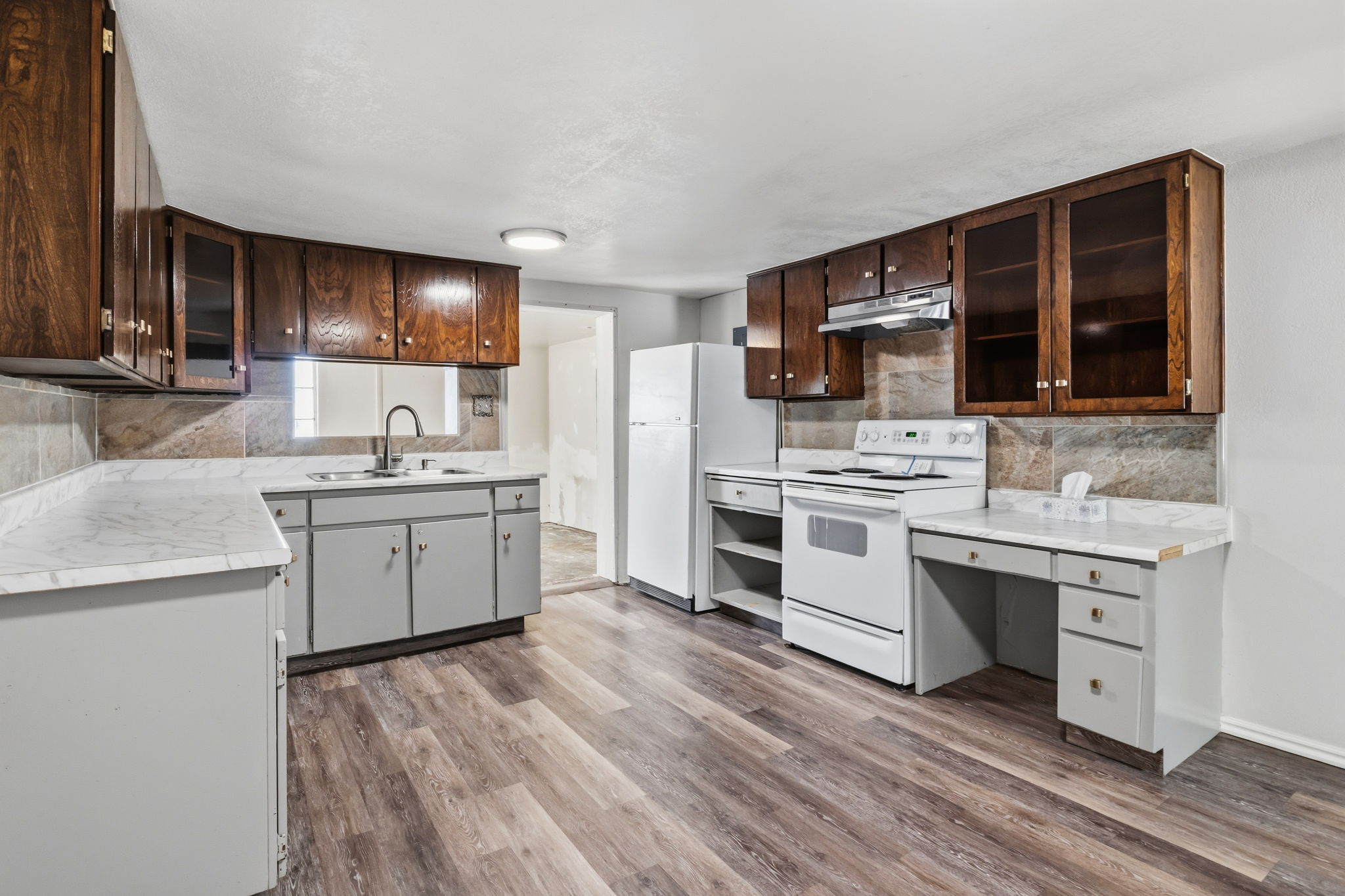 newer appliances, glass front cabinets