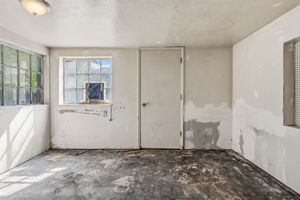 Original windows, cement floor