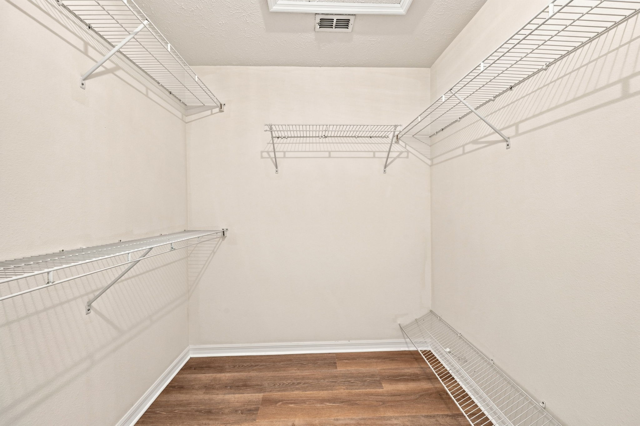Primary Bedroom Walk-in Closet1