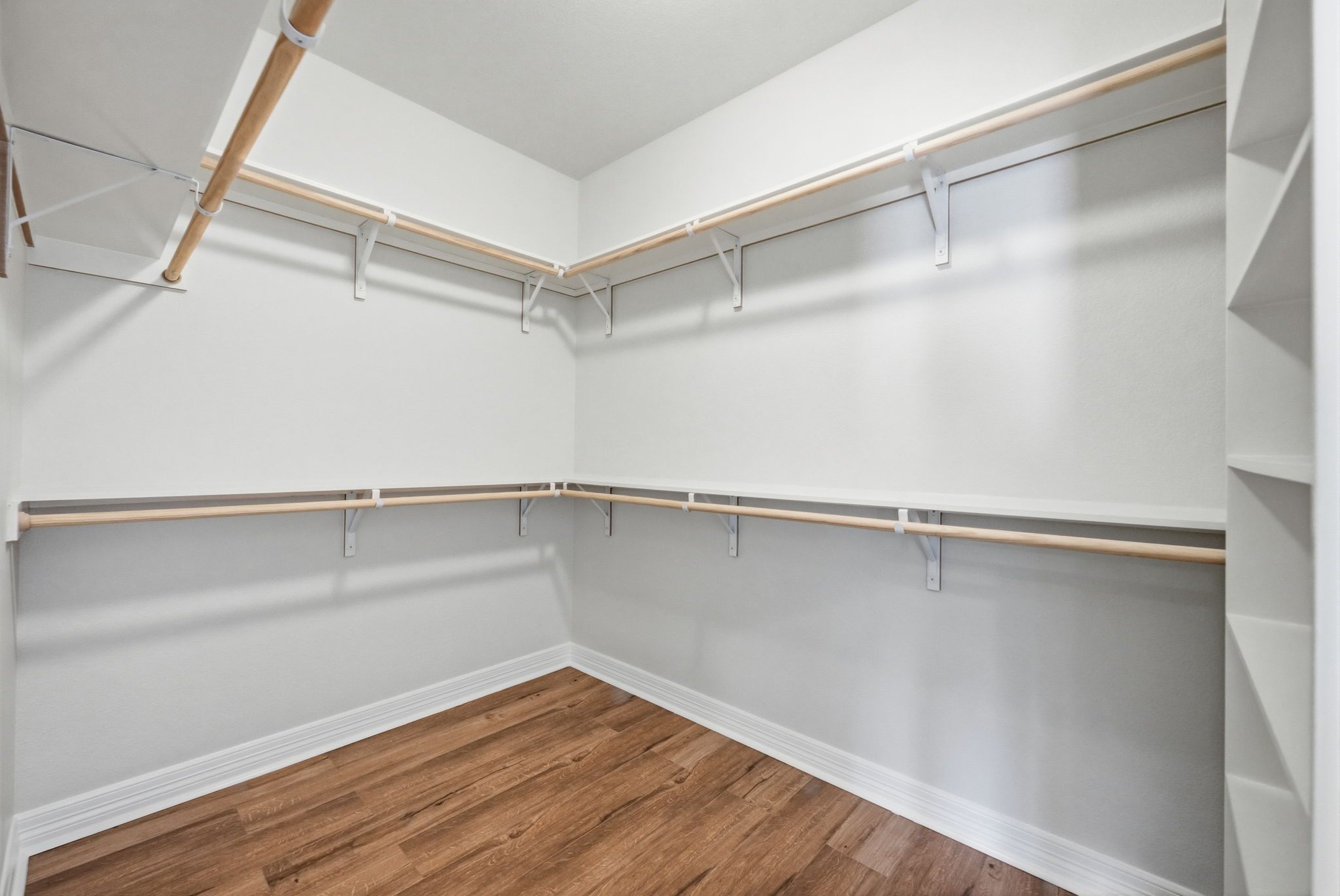 Primary Bedroom walk in closet