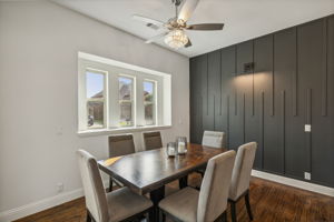 Custom Wallscape in formal dining with decorative custom lighting