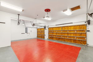 Get Fit!! This HOME GYM converted 3 car garage with hand poured rubber flooring can be used for your home gym or to showcase your cars.