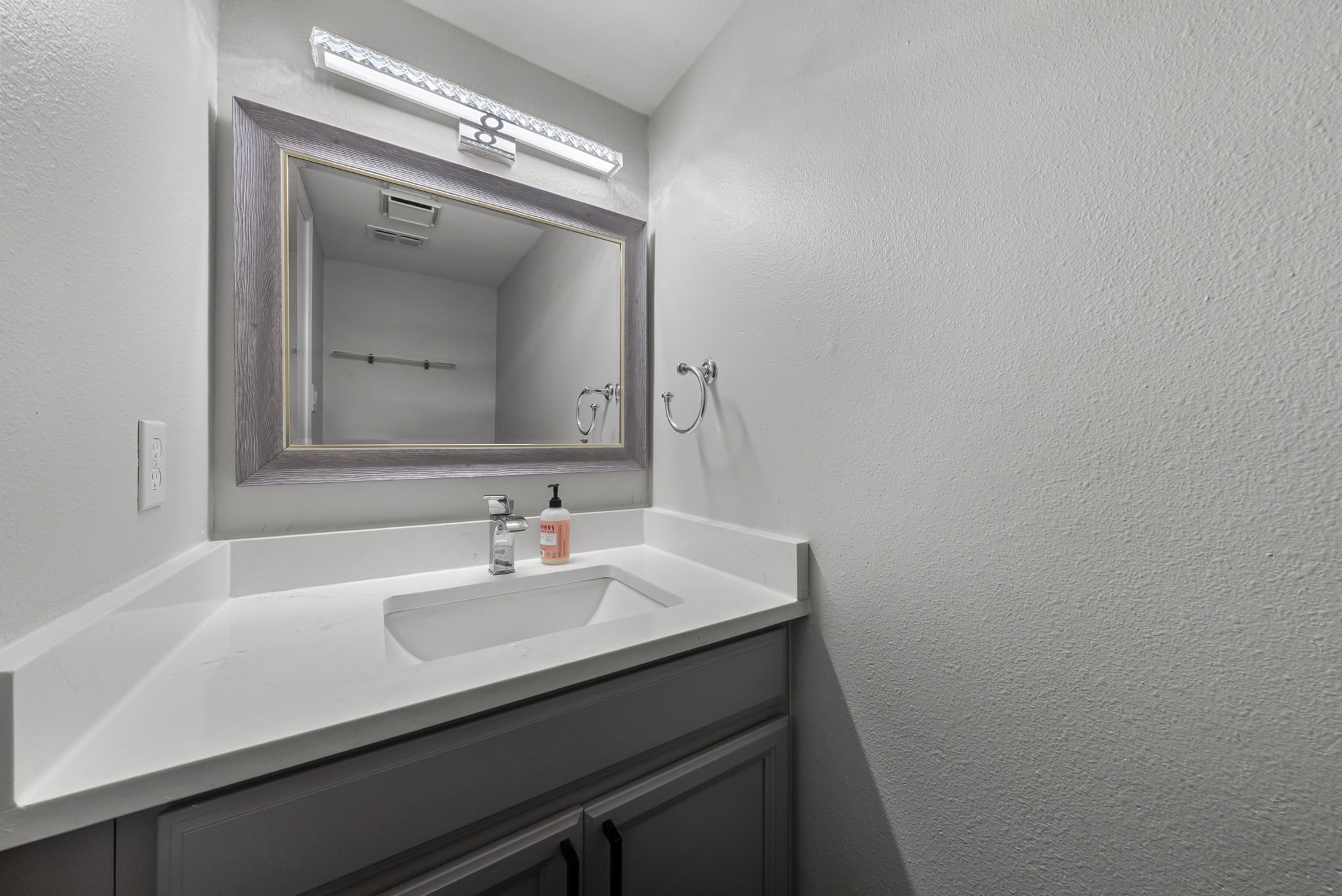 This is the half bath off the kitchen area.