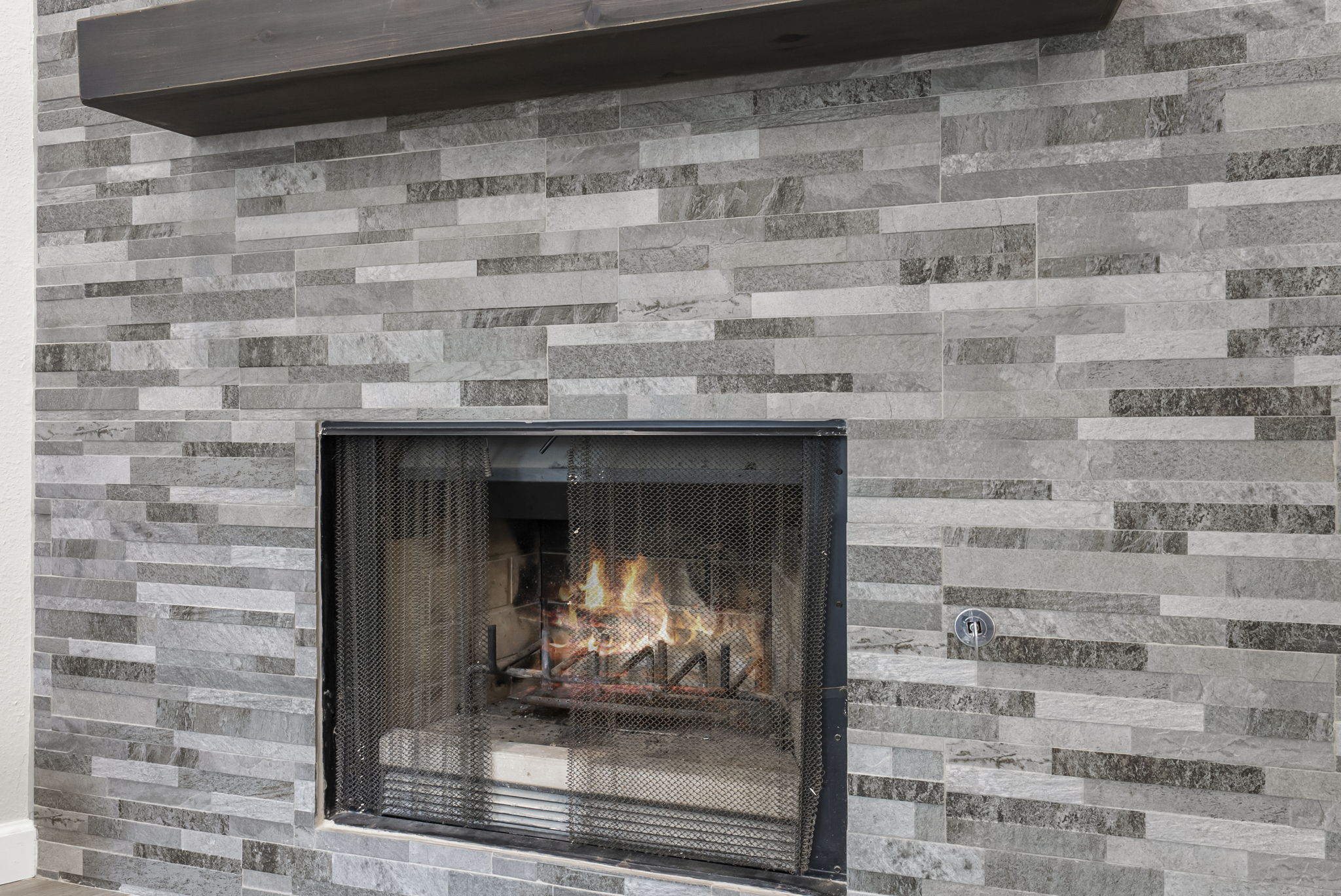 Fireplace with mantle.
