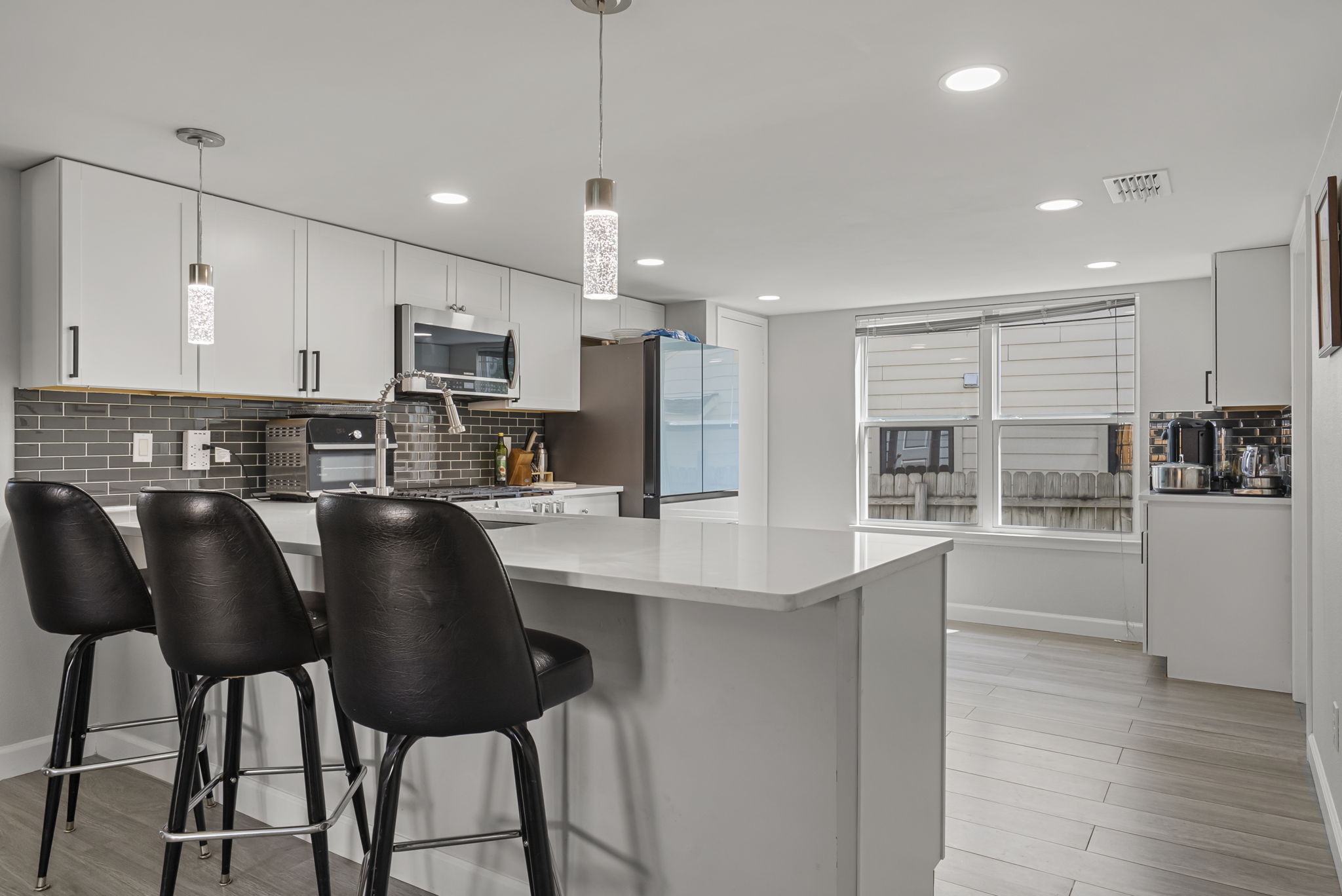 Beautifully updated eat-in kitchen, with added bonus of a breakfast bar! breakfast