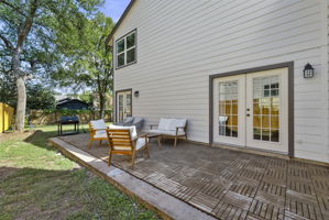Lovely patio with frech doors from the living/dining area as well as the primary suite on the main level.