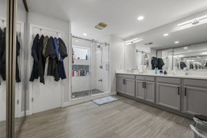The primary bathroom is updated with a walk-in shower and dual vanities!