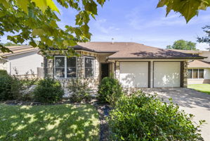 Lovely landscaping and a two car garage on a great Cul-de-sac street!