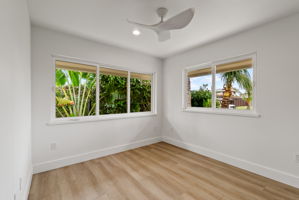 The second of four bedrooms is situated at the front corner of the property and is filled with natural light.