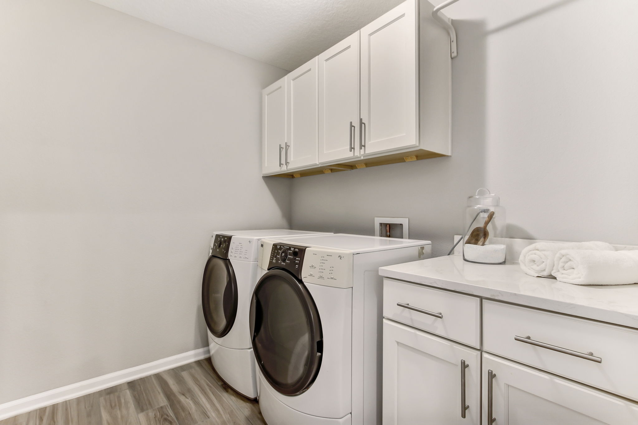 Laundry Room with built-in, washer and dryer included.