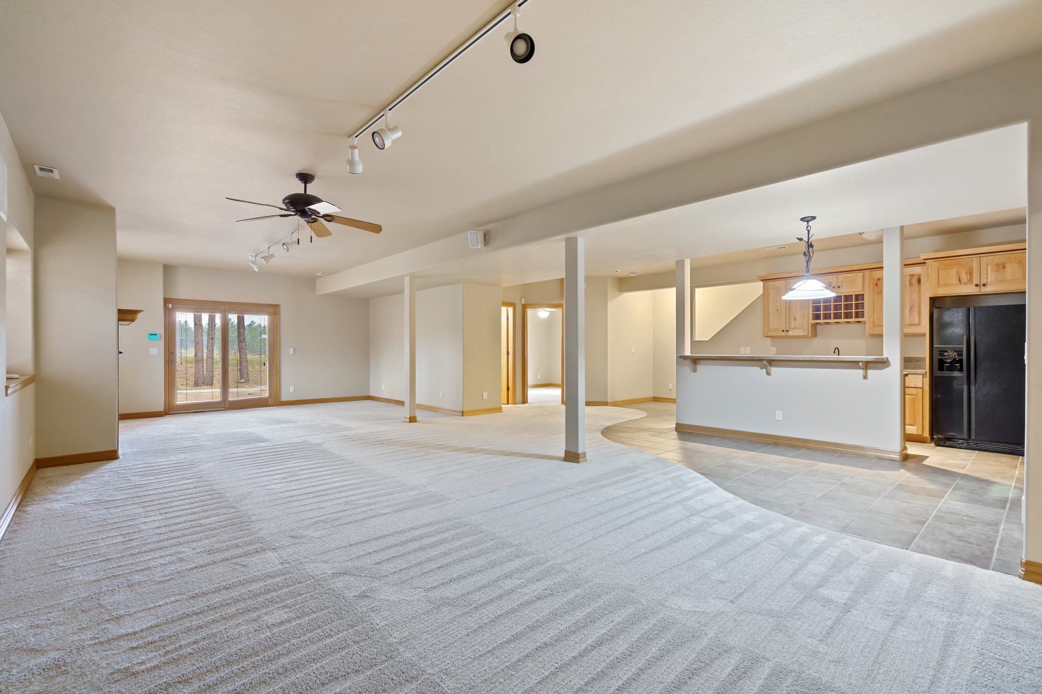Walk out Lower level doors to enjoy the lower level waterfall and pond.