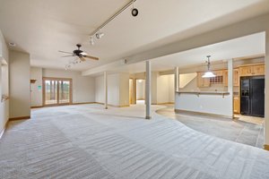 Walk out Lower level doors to enjoy the lower level waterfall and pond.
