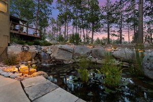 Waterfall to Lower Level Living Pond.