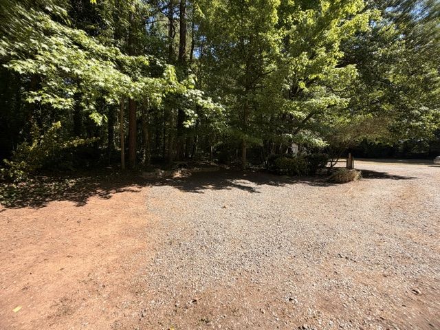 Side and back parking! No Hoa!