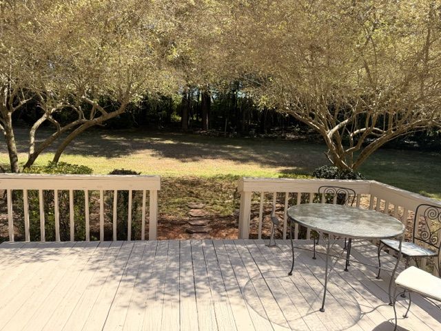 Wonderful access to yard and wood behind.